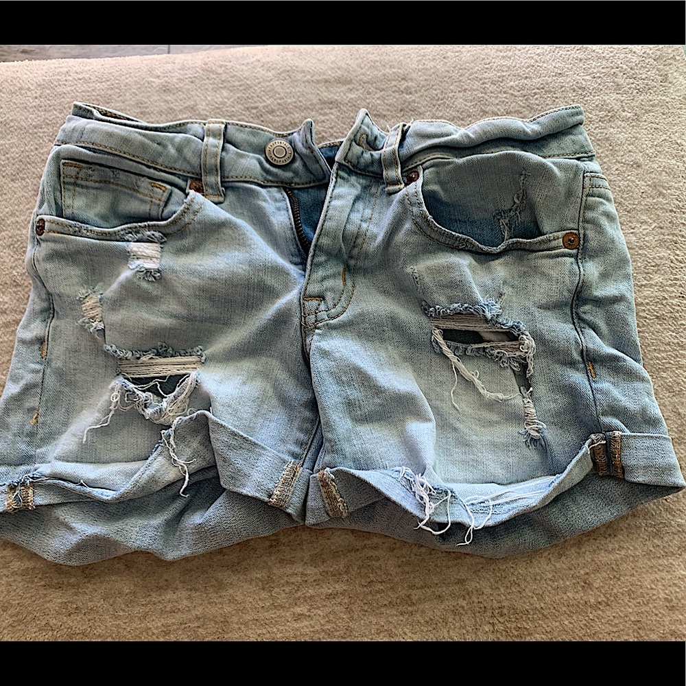 light blue ripped jean shorts